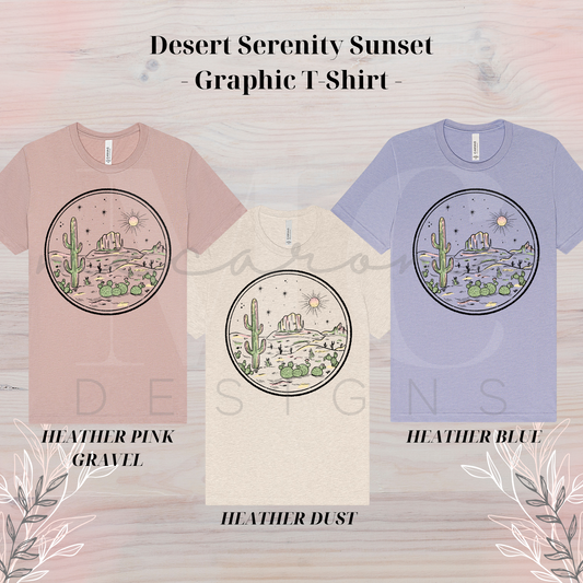 Three graphic t-shirts in heather pink gravel, heather dust, and heather blue, each featuring a circular desert sunset scene with cacti, mountains, and sun.